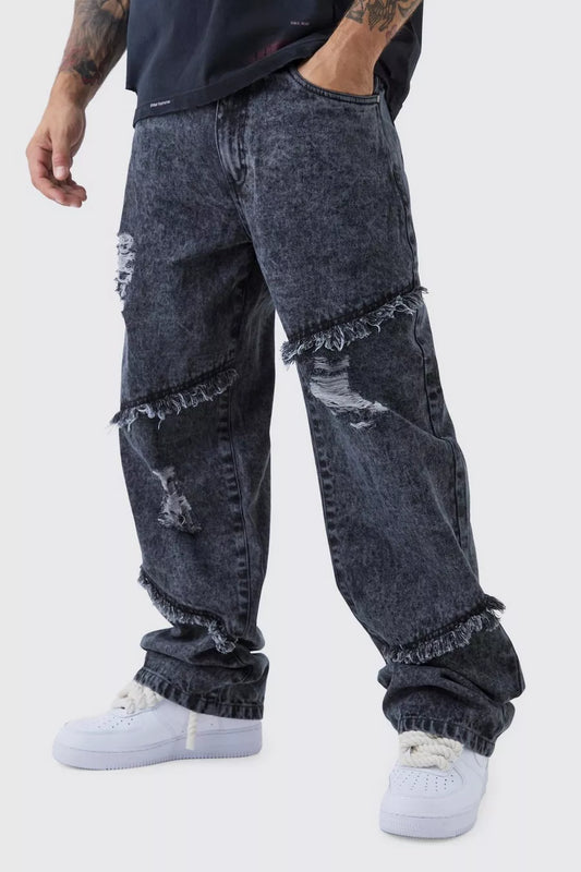 JEANS RILASSATI IN LAVAGGIO ACIDO STRAPPATI E SFILACCIATI